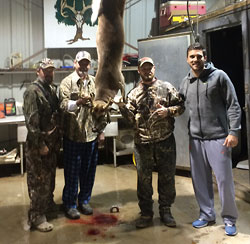 Jim, Jeff, Michael, Limb celebrating successful hunt